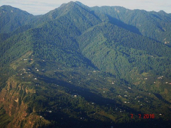 From the opposite side of the valley, Lakshman's house can be seen circled (bottom middle of picture)